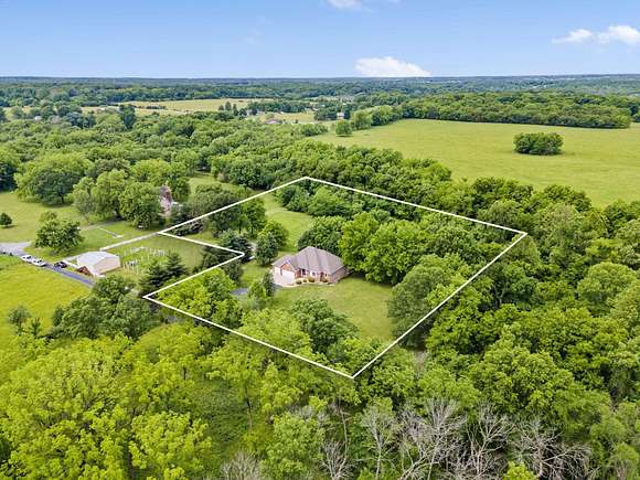 5 Acres of Residential Land with Home for Sale in Springfield, Missouri