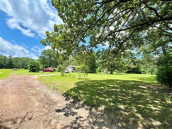 2.592 Acres of Residential Land with Home for Sale in Gilmer, Texas