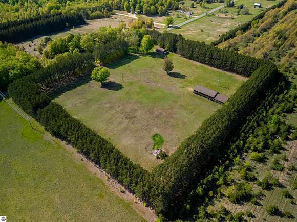 10.5 Acres of Land with Home for Sale in Kalkaska, Michigan
