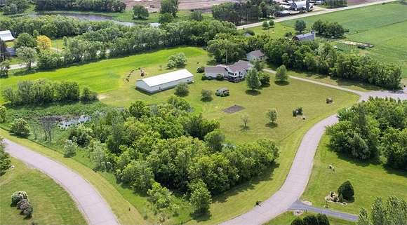 8.65 Acres of Residential Land with Home for Sale in Nowthen, Minnesota