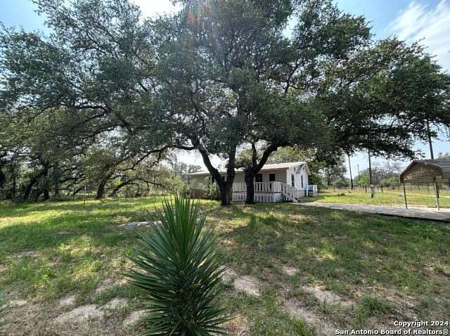 10.08 Acres of Land with Home for Sale in Natalia, Texas