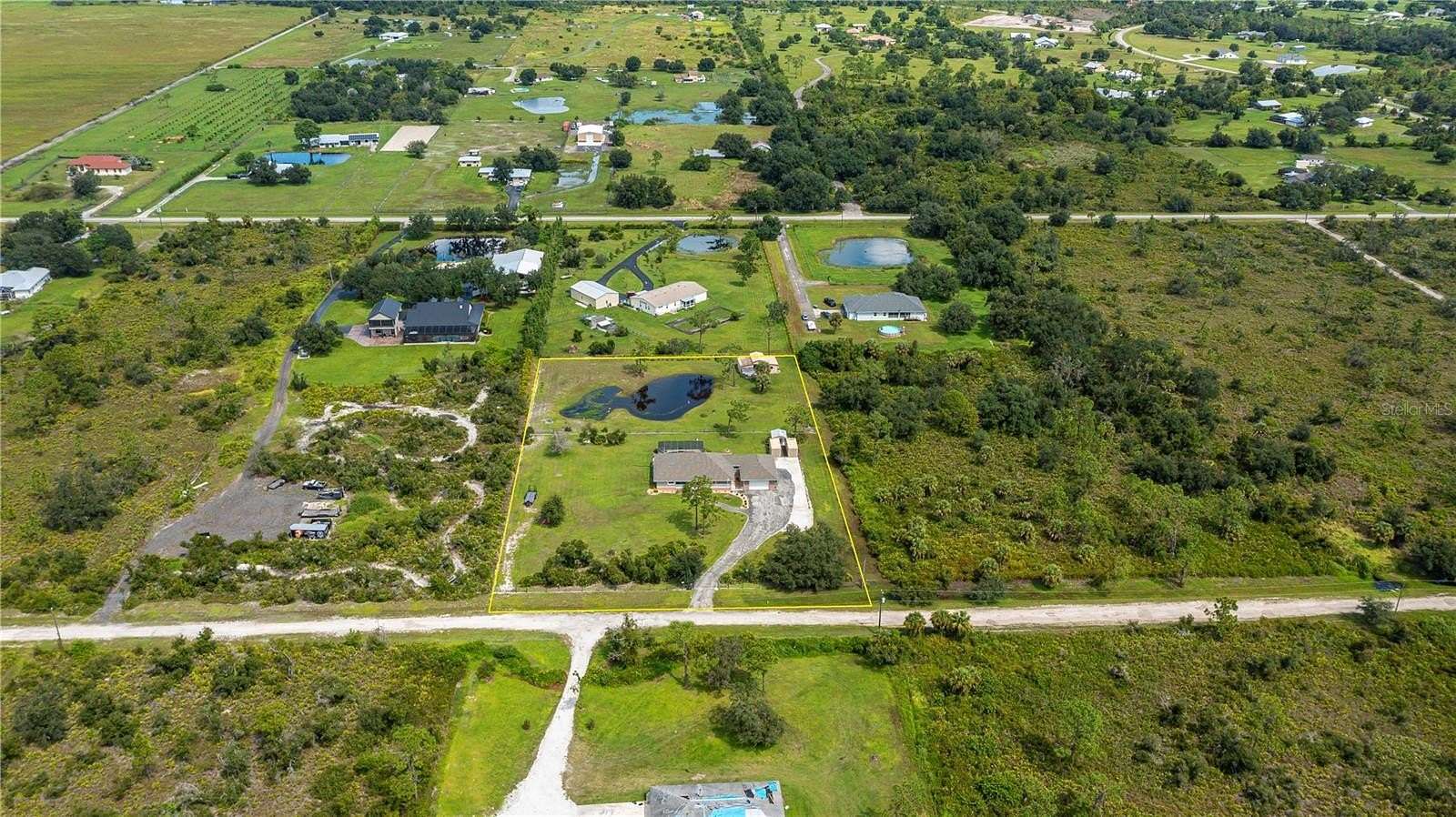 2.5 Acres of Residential Land with Home for Sale in Punta Gorda, Florida