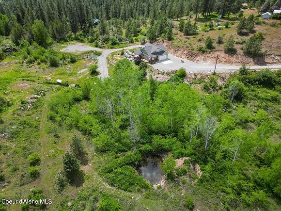 10.2 Acres of Recreational Land with Home for Sale in Hauser, Idaho