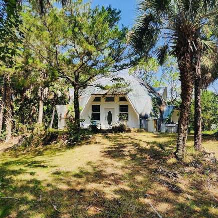 2.31 Acres of Residential Land with Home for Sale in Cocoa, Florida