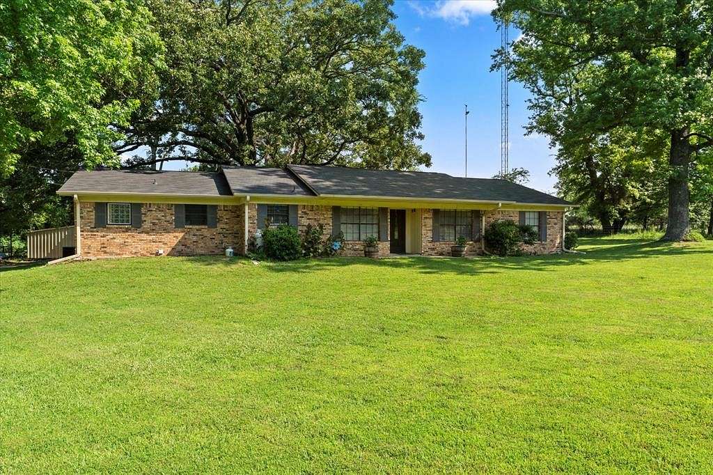 6.8 Acres of Land with Home for Sale in Mount Pleasant, Texas