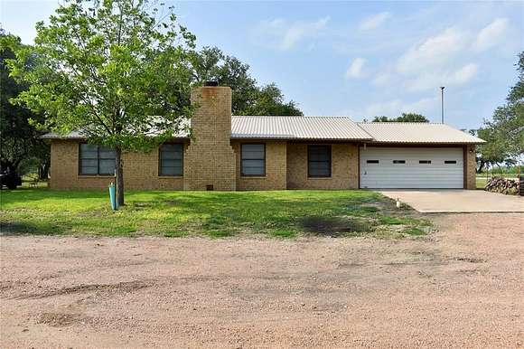 13.5 Acres of Recreational Land with Home for Sale in Rochelle, Texas