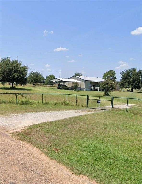 4.5 Acres of Residential Land with Home for Sale in Boyd, Texas