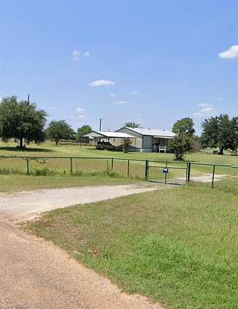 4.5 Acres of Residential Land with Home for Sale in Boyd, Texas