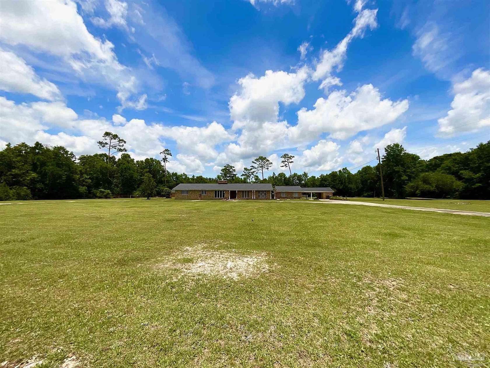 2.7 Acres of Residential Land with Home for Sale in Cantonment, Florida