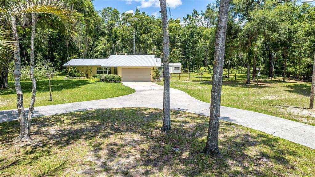 2.3 Acres of Residential Land with Home for Sale in Inverness, Florida