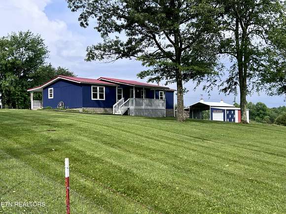 5.3 Acres of Land with Home for Sale in Deer Lodge, Tennessee