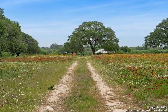 100 Acres of Agricultural Land with Home for Sale in Elmendorf, Texas