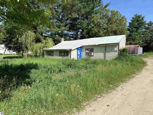 7.7 Acres of Residential Land with Home for Sale in Fife Lake, Michigan