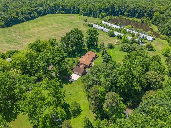50.3 Acres of Agricultural Land with Home for Sale in Julian, North Carolina