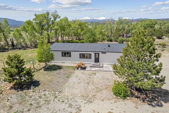4.8 Acres of Residential Land with Home for Sale in Salida, Colorado