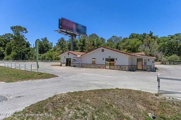 0.55 Acres of Commercial Land for Sale in Spring Hill, Florida