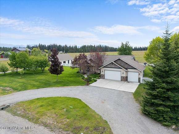 4.8 Acres of Residential Land with Home for Sale in Rathdrum, Idaho