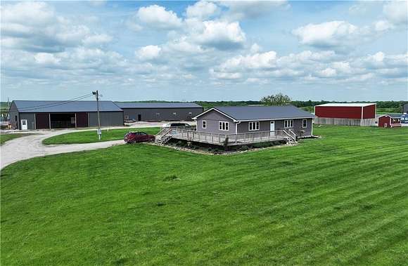 237 Acres of Land with Home for Sale in Russell, Iowa