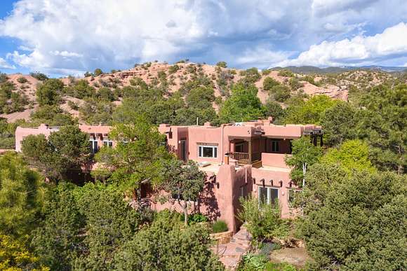 26.9 Acres of Agricultural Land with Home for Sale in Santa Fe, New Mexico