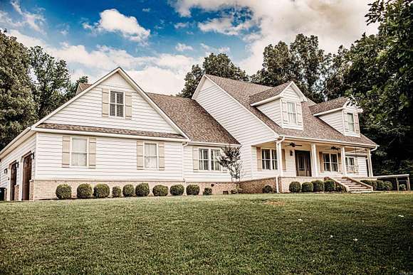 2 Acres of Residential Land with Home for Sale in Piggott, Arkansas