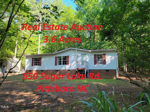 3.6 Acres of Residential Land with Home for Auction in Pittsboro, North Carolina