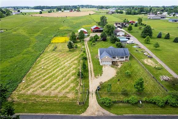 5.9 Acres of Land with Home for Sale in Orrville, Ohio