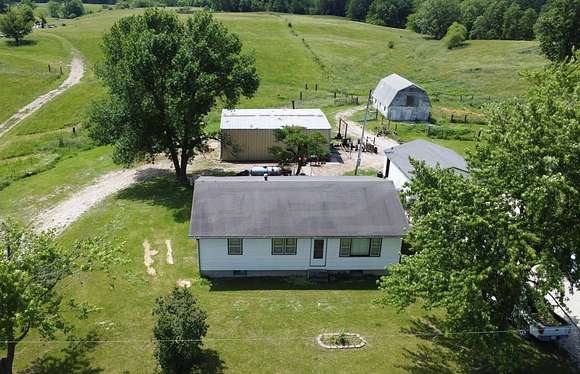 Land with Home for Auction in Moberly, Missouri