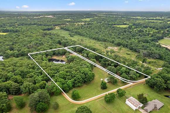 8.8 Acres of Land with Home for Sale in Mount Pleasant, Texas