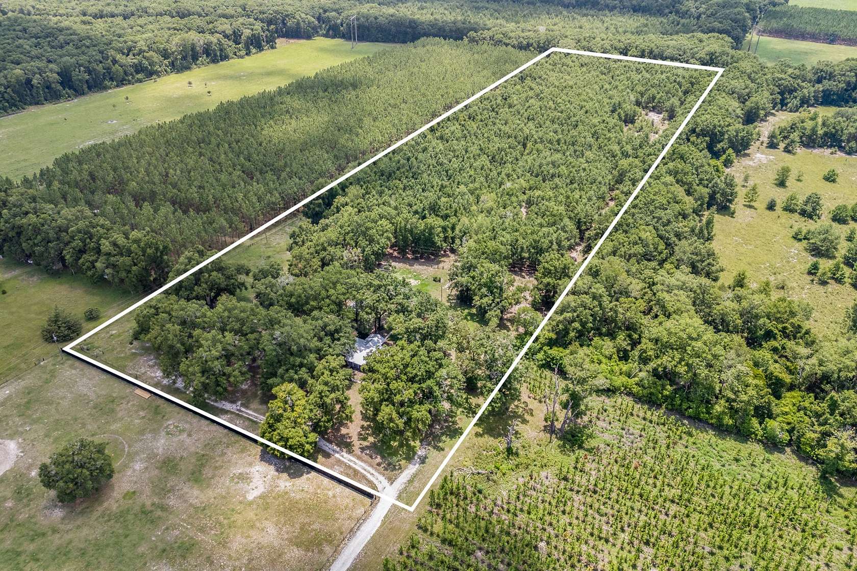 16.39 Acres of Recreational Land with Home for Sale in High Springs, Florida