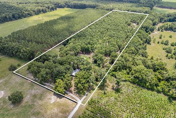 16.4 Acres of Recreational Land with Home for Sale in High Springs, Florida