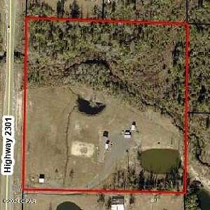 7.2 Acres of Residential Land with Home for Sale in Panama City, Florida
