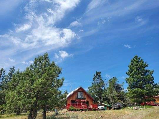 80 Acres of Land with Home for Sale in New Pine Creek, Oregon