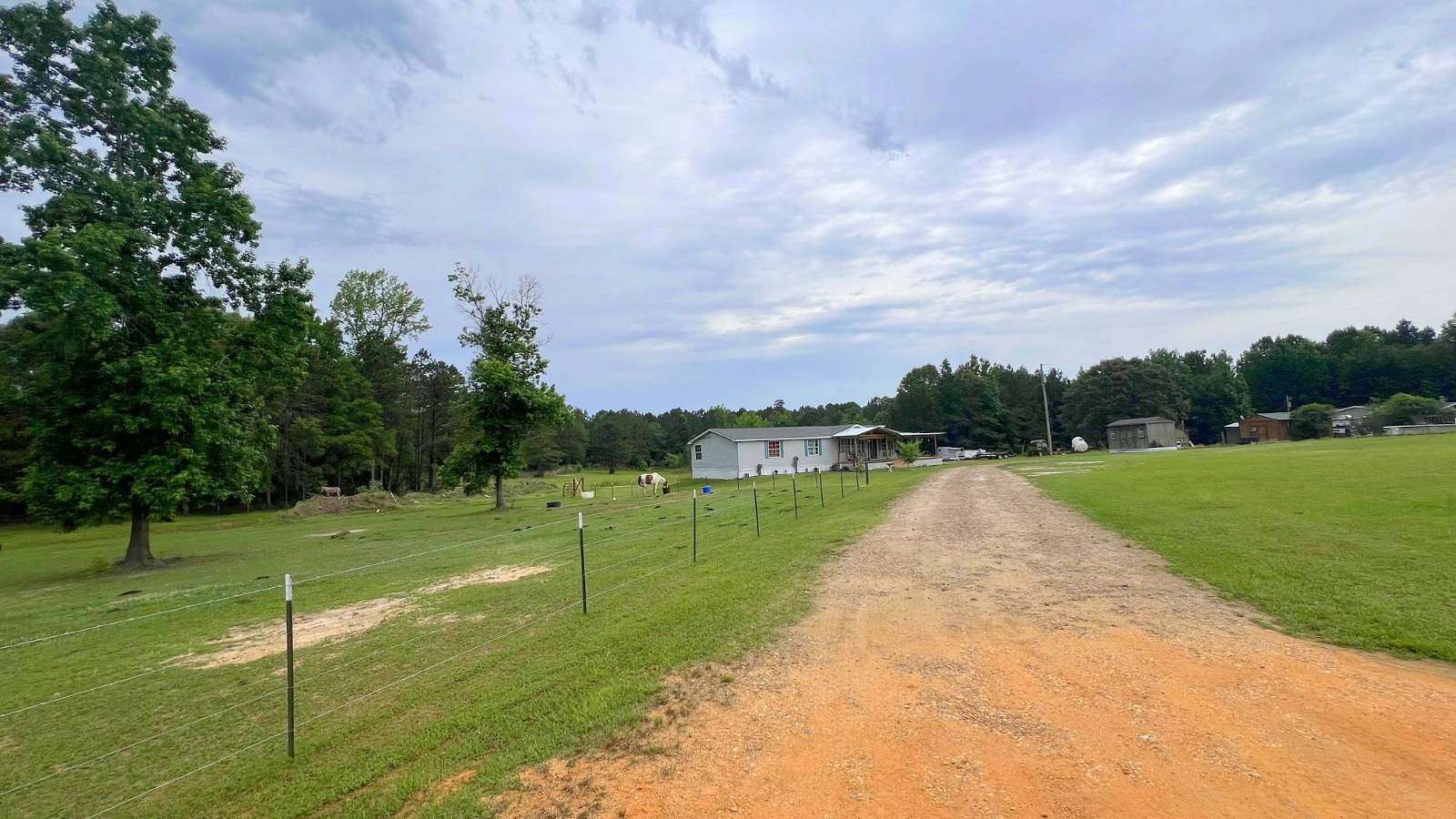 6.8 Acres of Residential Land with Home for Sale in Magnolia, Arkansas