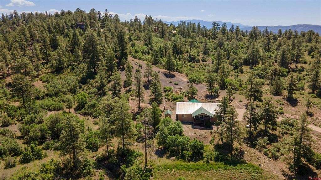 5.01 Acres of Residential Land with Home for Sale in Pagosa Springs, Colorado