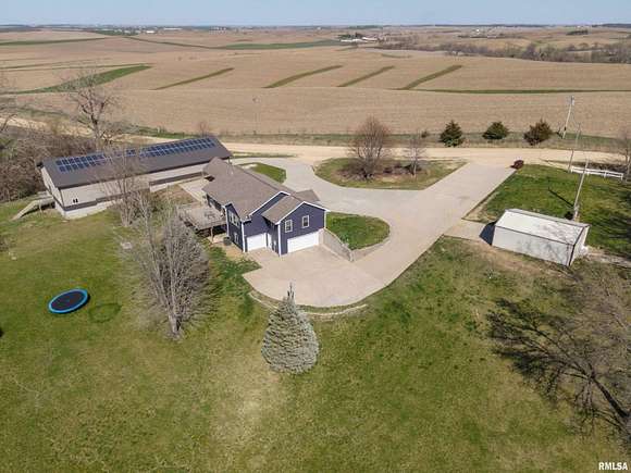 9.7 Acres of Residential Land with Home for Sale in Charlotte, Iowa