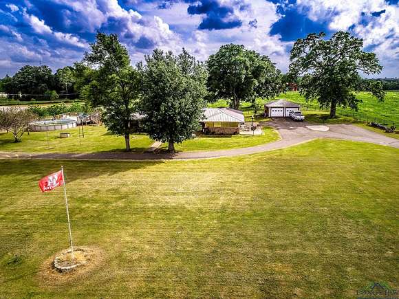 212.3 Acres of Land with Home for Sale in Carthage, Texas