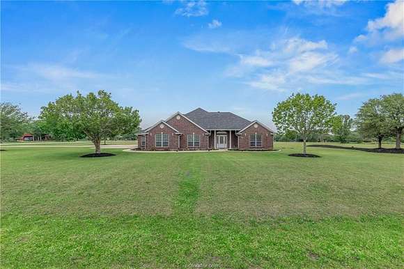 2.5 Acres of Residential Land with Home for Sale in College Station, Texas
