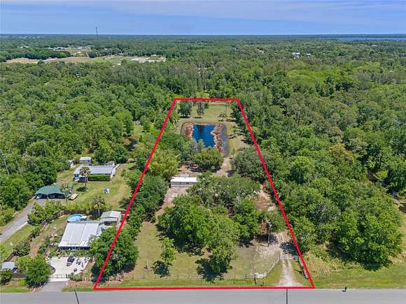 2.6 Acres of Residential Land with Home for Sale in St. Cloud, Florida