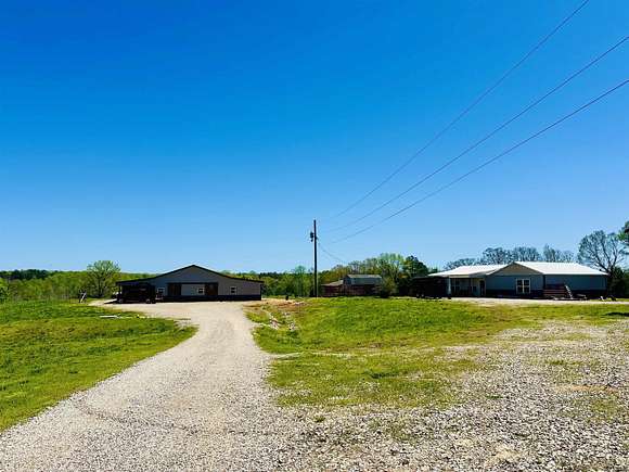 37.2 Acres of Agricultural Land with Home for Sale in Bethel Springs, Tennessee
