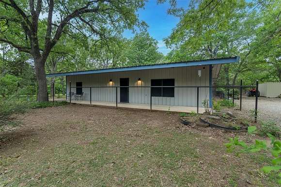 3.2 Acres of Residential Land with Home for Sale in Quinlan, Texas