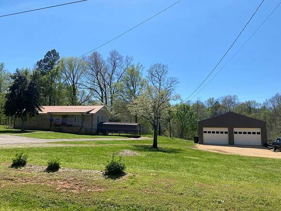 4.6 Acres of Land with Home for Sale in Savannah, Tennessee