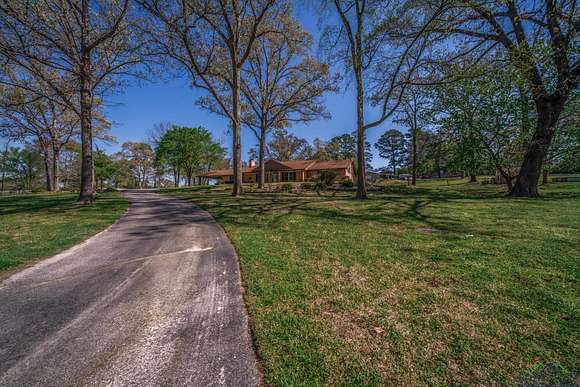 3.2 Acres of Residential Land with Home for Sale in Gladewater, Texas