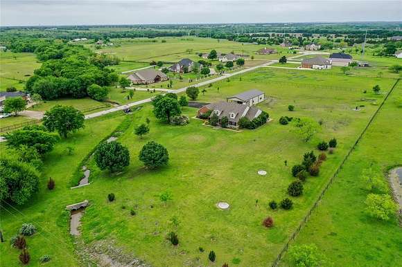 4.9 Acres of Residential Land with Home for Sale in Terrell, Texas