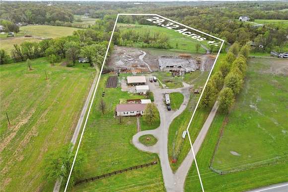 29.13 Acres of Agricultural Land with Home for Sale in Smithville, Missouri