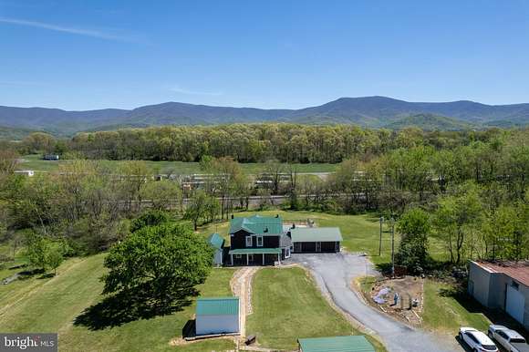 3.9 Acres of Residential Land with Home for Sale in Stanley, Virginia
