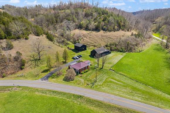 52.7 Acres of Agricultural Land with Home for Sale in Olive Hill, Kentucky