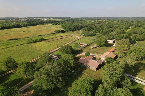 18.2 Acres of Land with Home for Sale in Springtown, Texas