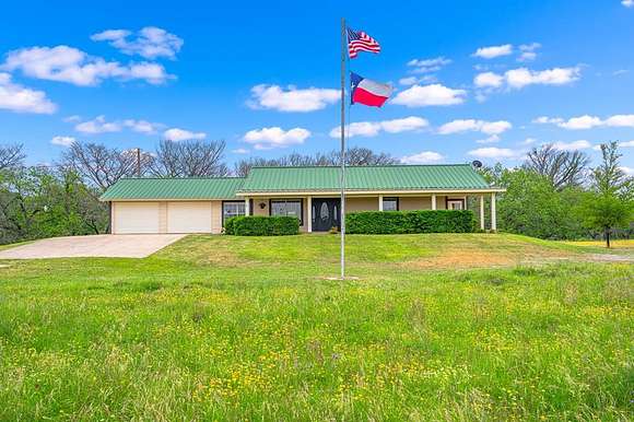 11.6 Acres of Land with Home for Sale in Center Point, Texas