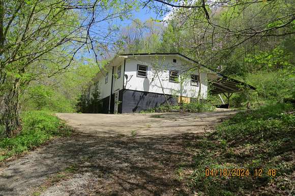 4.7 Acres of Residential Land with Home for Sale in Harlan, Kentucky
