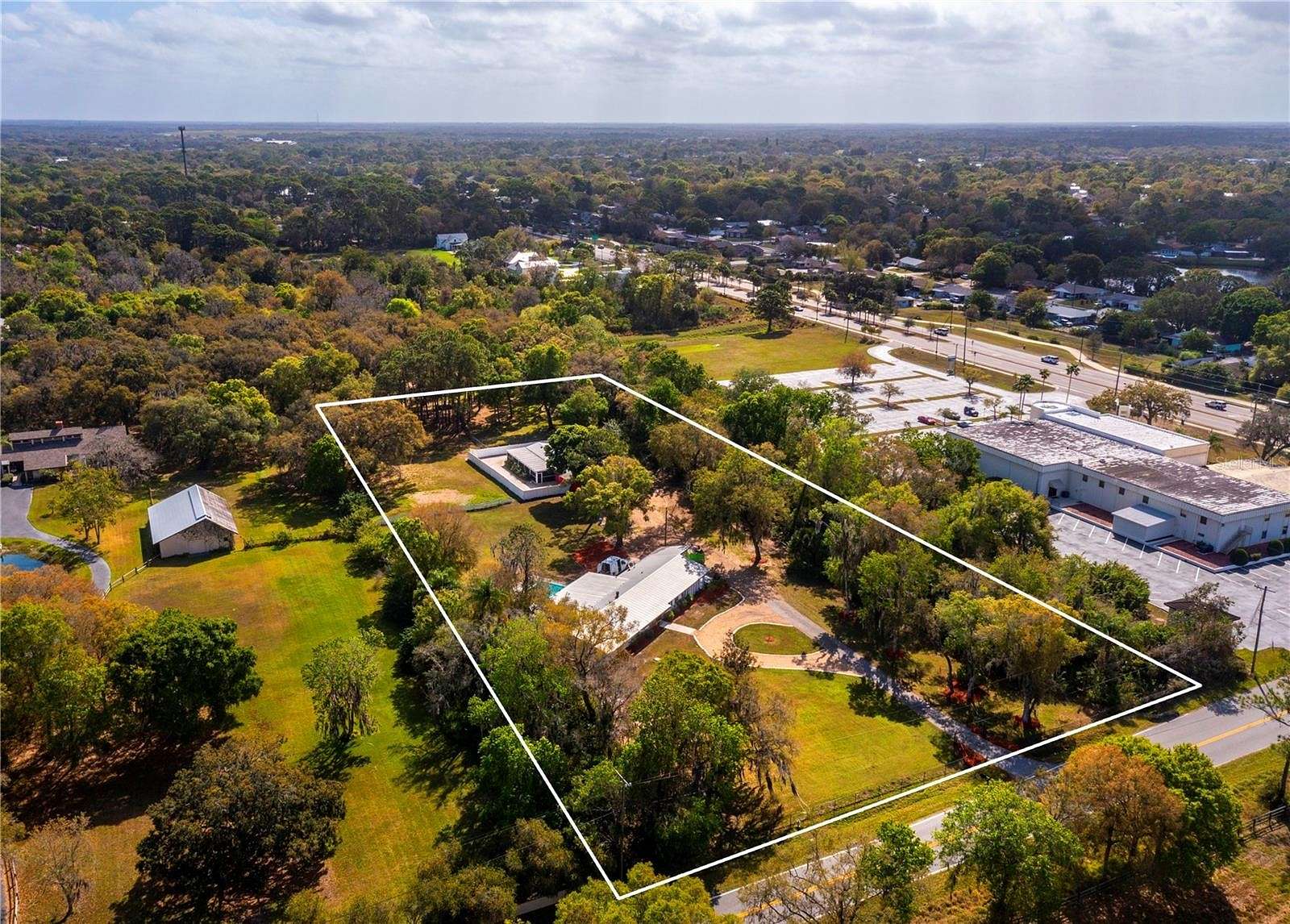 4.9 Acres of Residential Land with Home for Sale in Sarasota, Florida